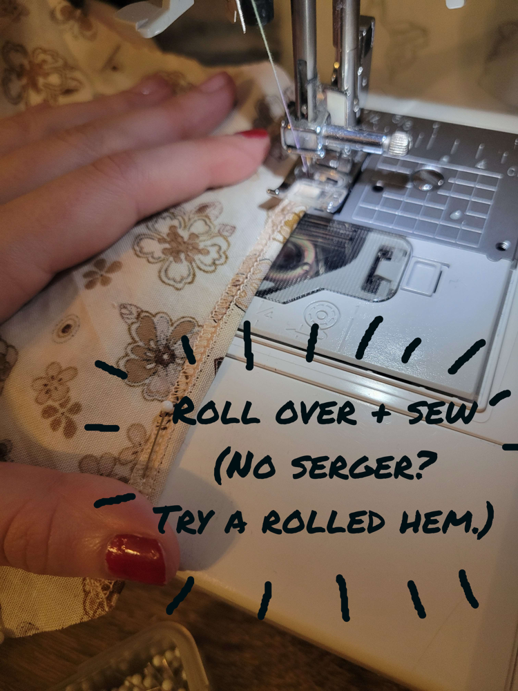 (image: Folding the serged edges over and sewing them down flat with a top-stitch. )