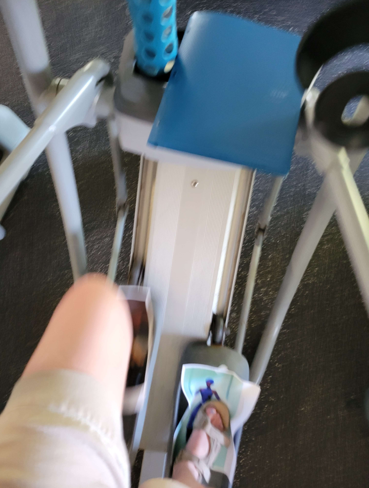 (image: Using the elliptical with AI upscaled heroes taped to the pedals. )